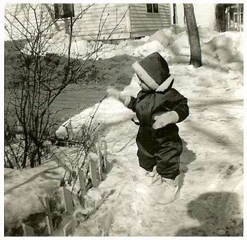 child in snowsuit