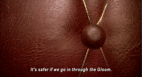 An animated gif from Night Watch featuring a subtitle that recedes and breaks apart as the characters go into the alternate reality known as the Gloom. Subtitle: 'It's safer if we go in through the Gloom.'