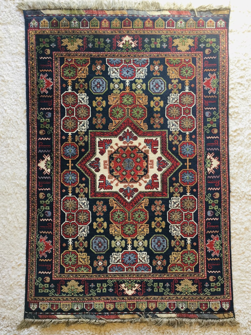 a multi-color geometric rug