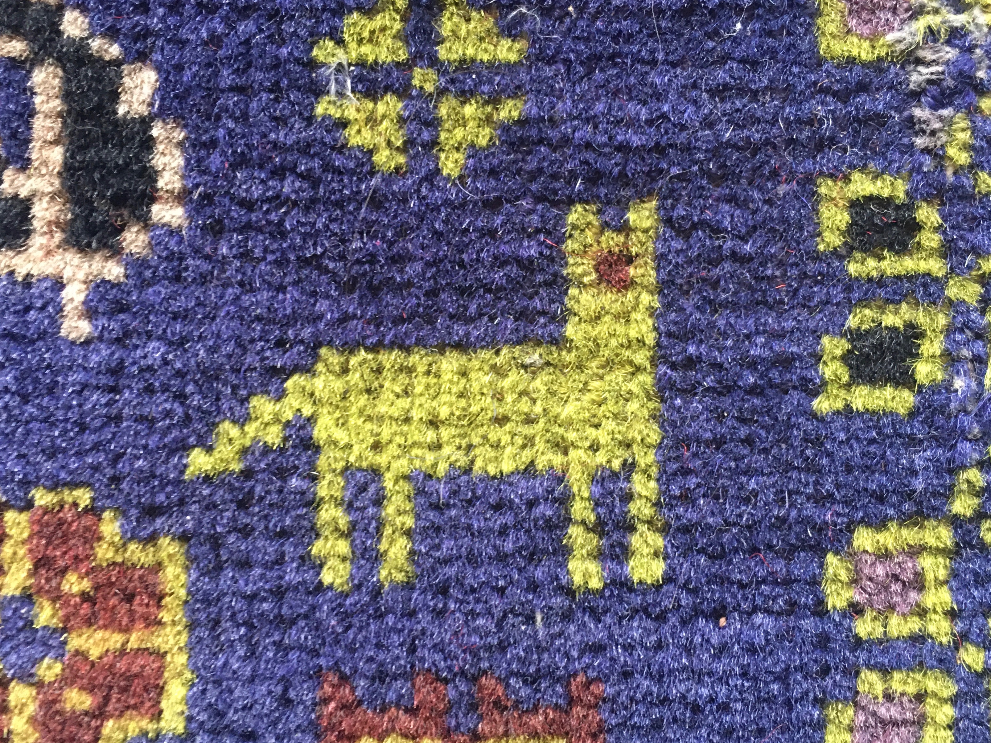 Rug detail with animal shape