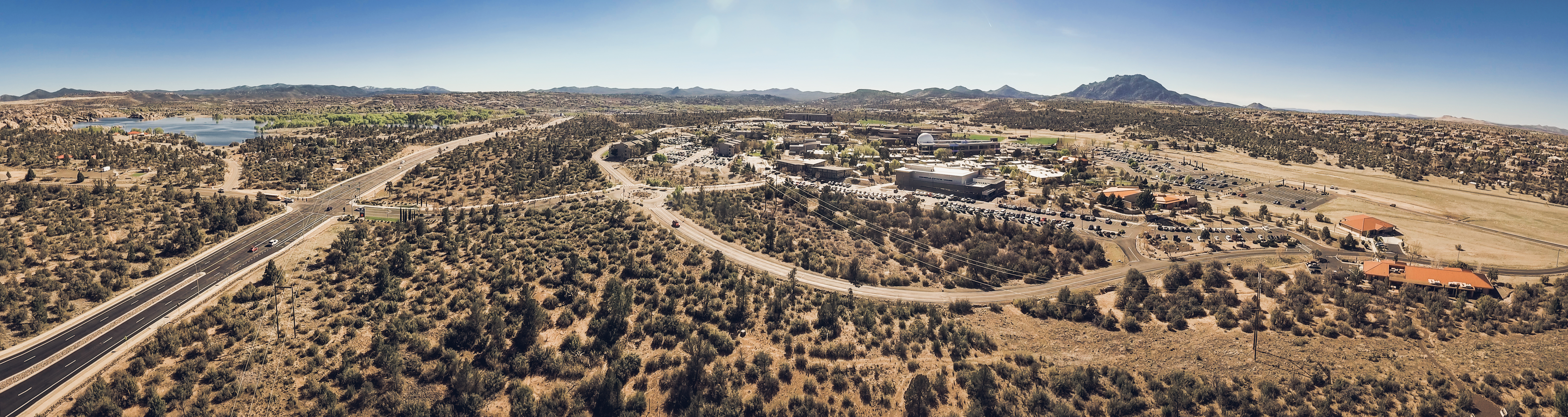 Aerial panoramic photograph of Embry-Riddle Aeronautical University's Prescott campus, a view from the north, facing south.