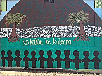 Mural depicting a mountain, a wall of rocks, two trees, and a line of children sillouettes, holding hands.