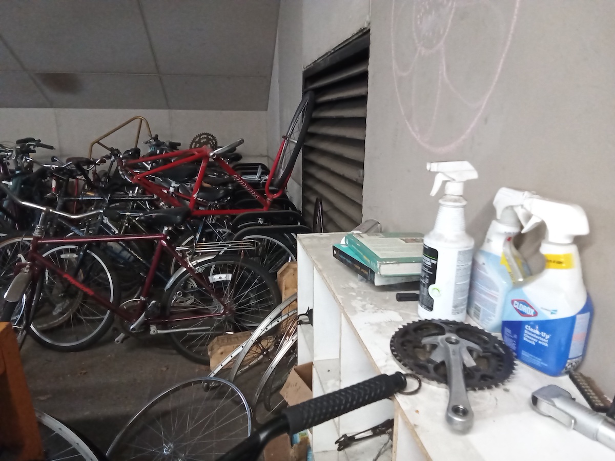 Piles of used bicycles waiting for a tune-up.