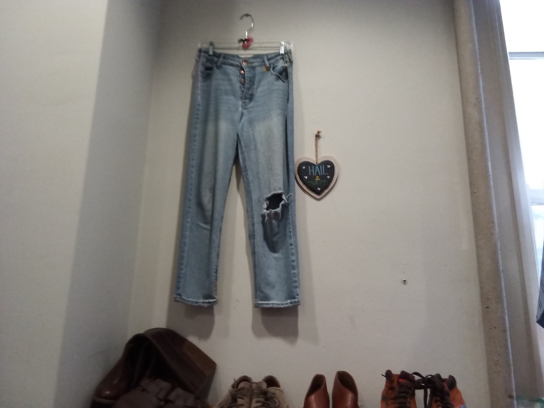 a thrift store.The thrift store provides a cheap way to buy and reuse clothes.