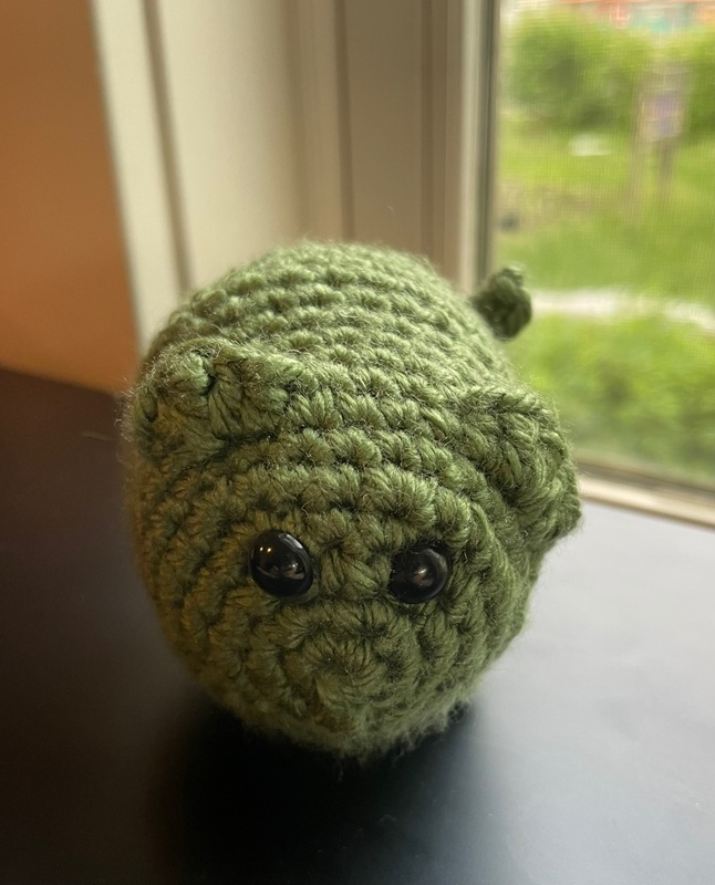 Forest green conference creature Profile Picture.